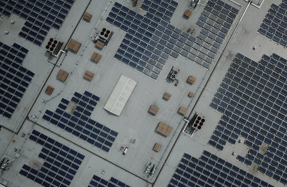 Industrial solar panels on a large commercial facility